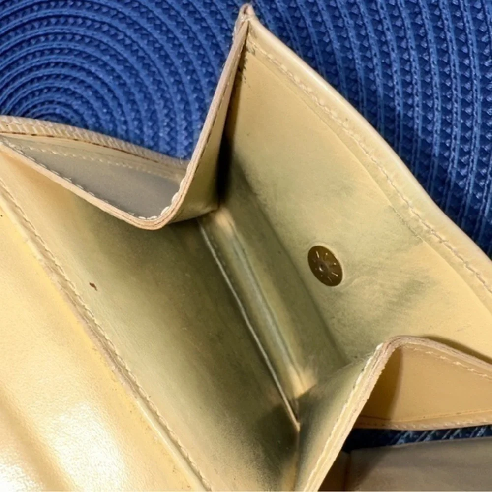 AUTHENTIC Louis Vuitton Marco Wallet. Previously owned. Light yellow.